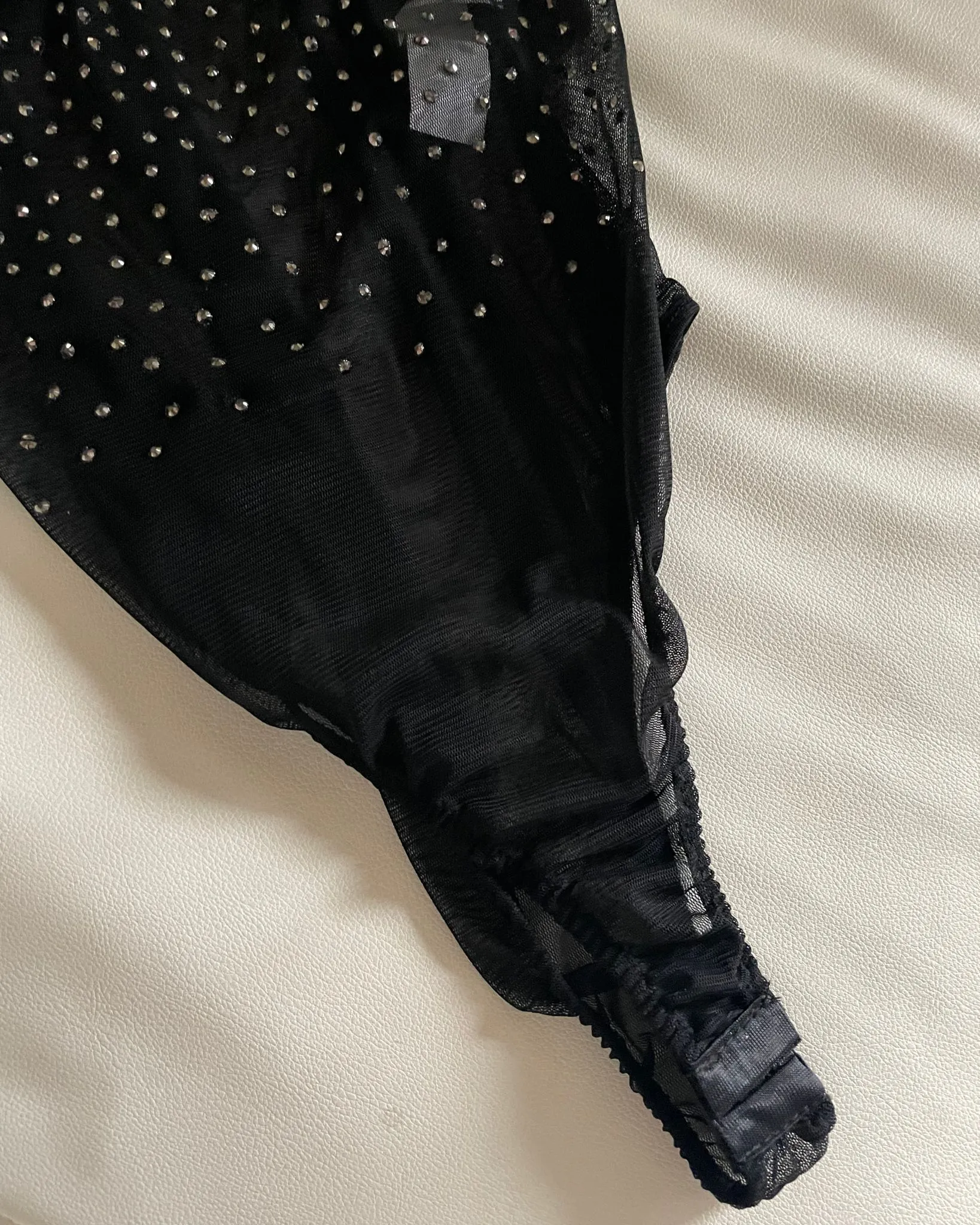 Body trasparente con strass in rilevo