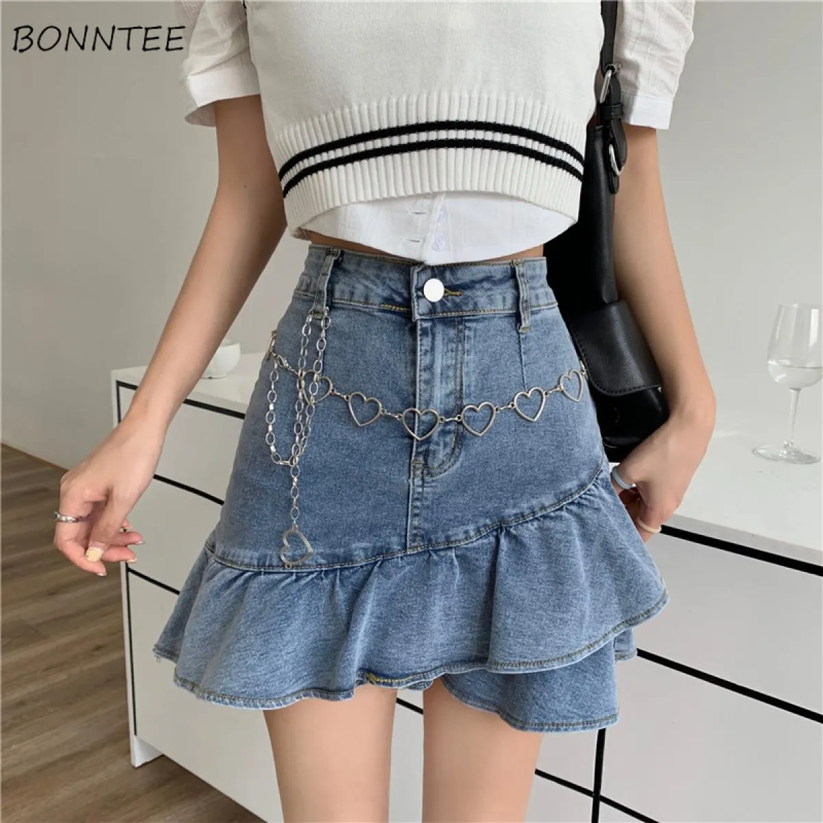 Gonna con volant da donna Mini gonna di jeans con volant Mini gonna di jeans con volant Gonne estive