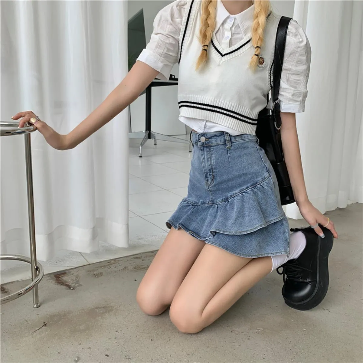 Gonna con volant da donna Mini gonna di jeans con volant Mini gonna di jeans con volant Gonne estive