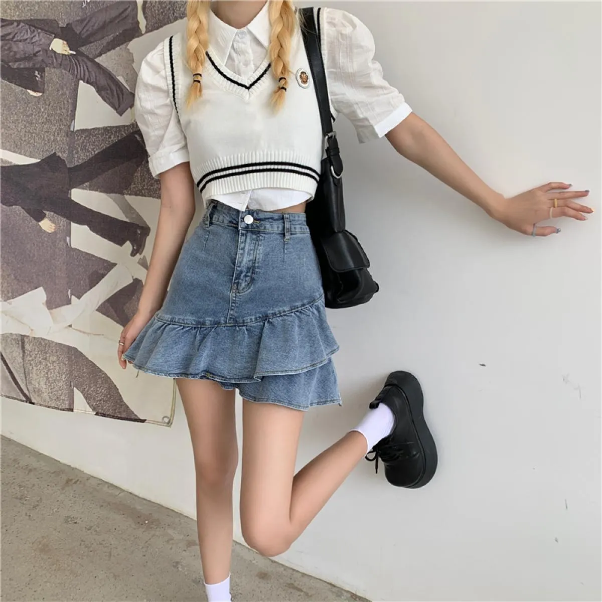 Gonna con volant da donna Mini gonna di jeans con volant Mini gonna di jeans con volant Gonne estive