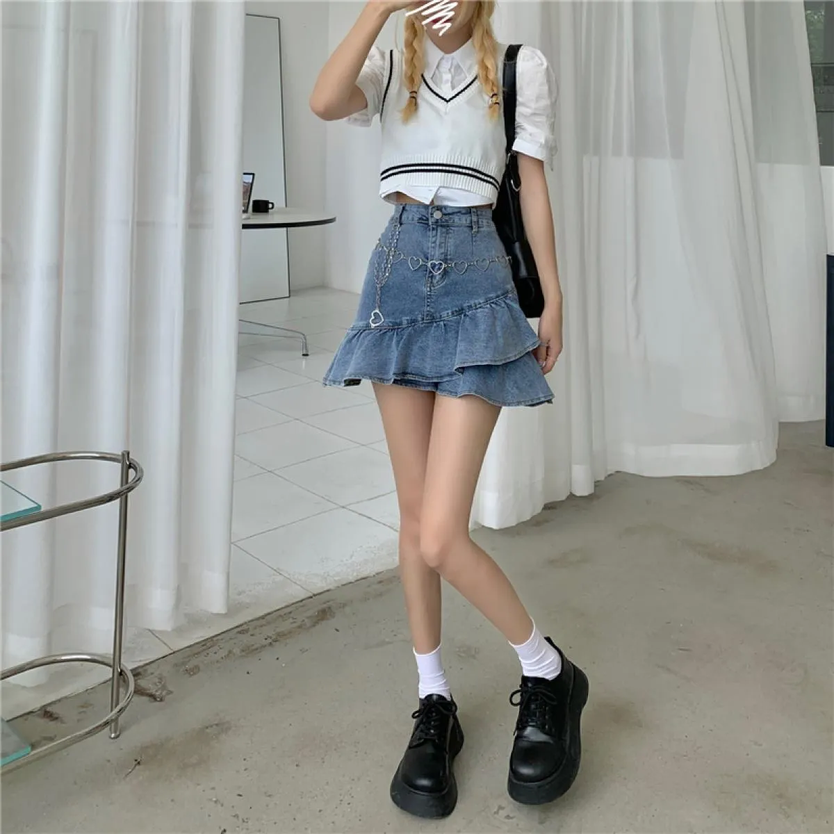 Gonna con volant da donna Mini gonna di jeans con volant Mini gonna di jeans con volant Gonne estive
