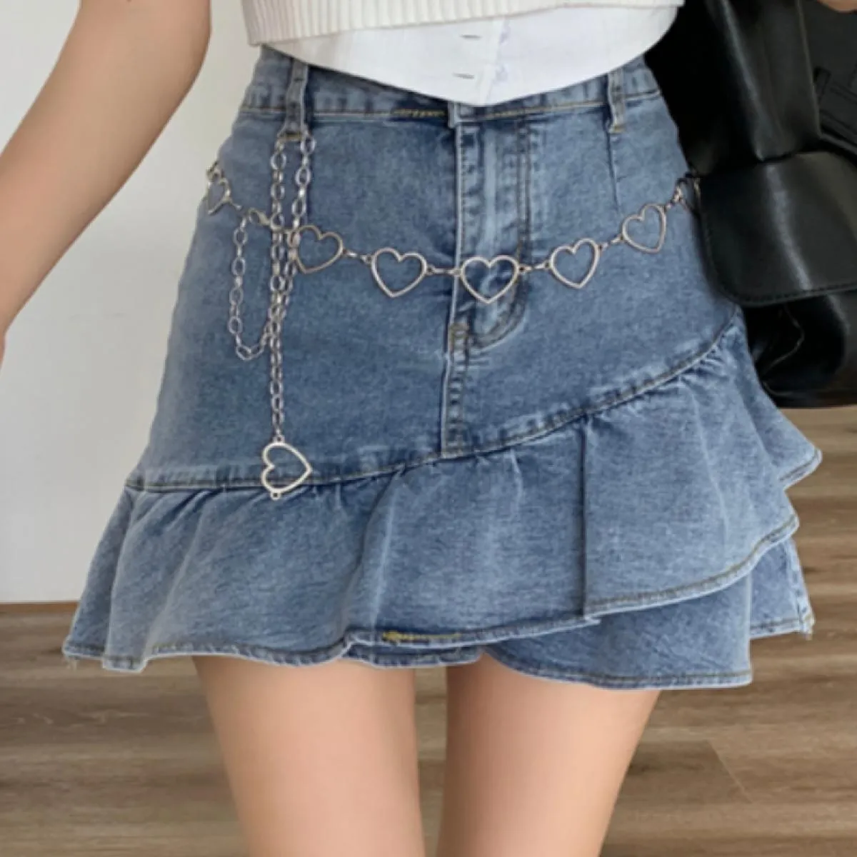 Gonna con volant da donna Mini gonna di jeans con volant Mini gonna di jeans con volant Gonne estive