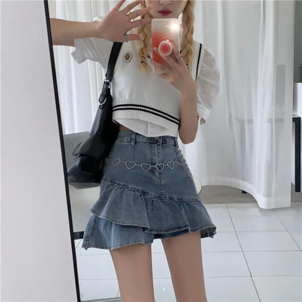 Gonna con volant da donna Mini gonna di jeans con volant Mini gonna di jeans con volant Gonne estive