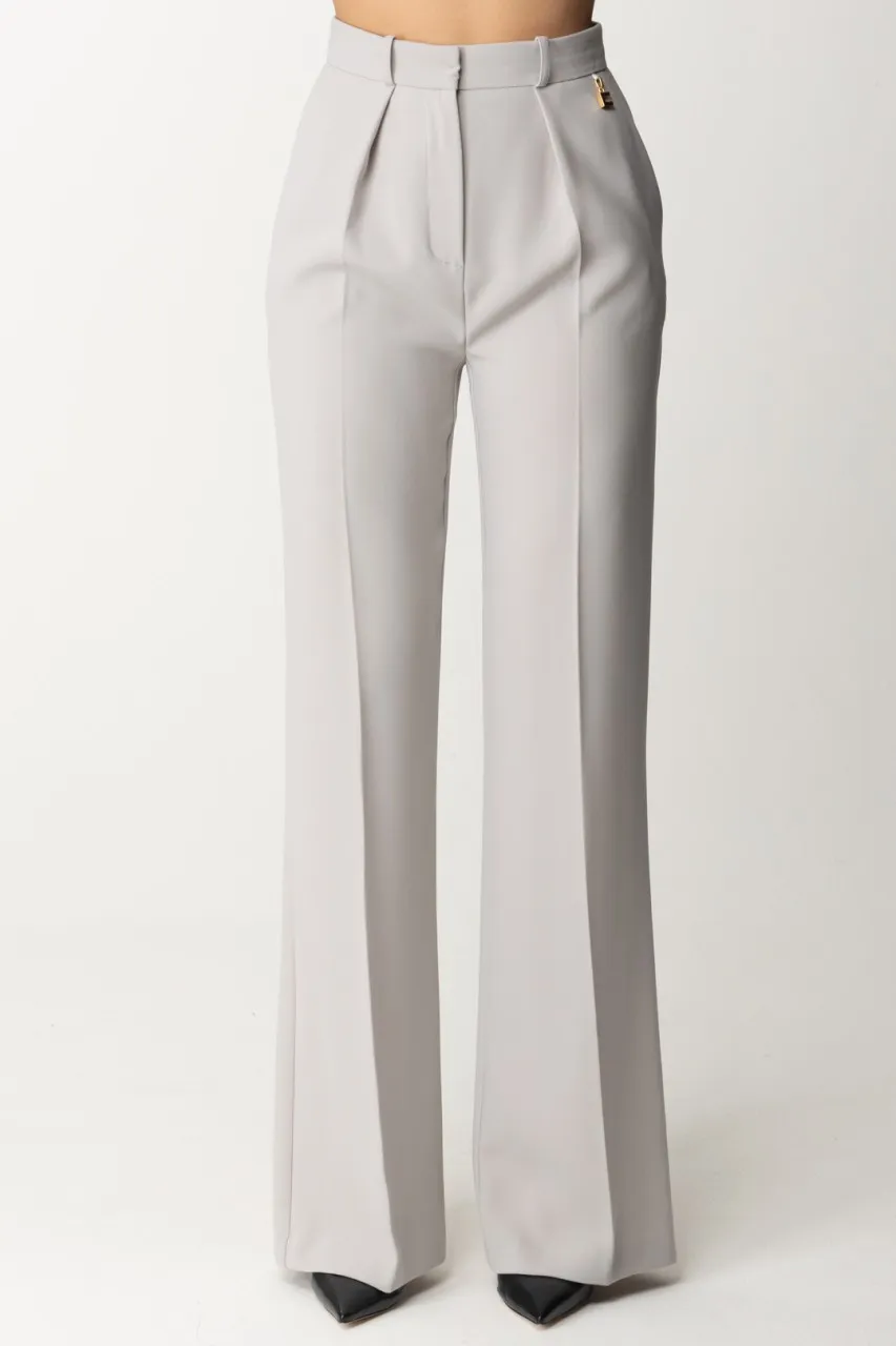 Pantaloni con charm logo Perla