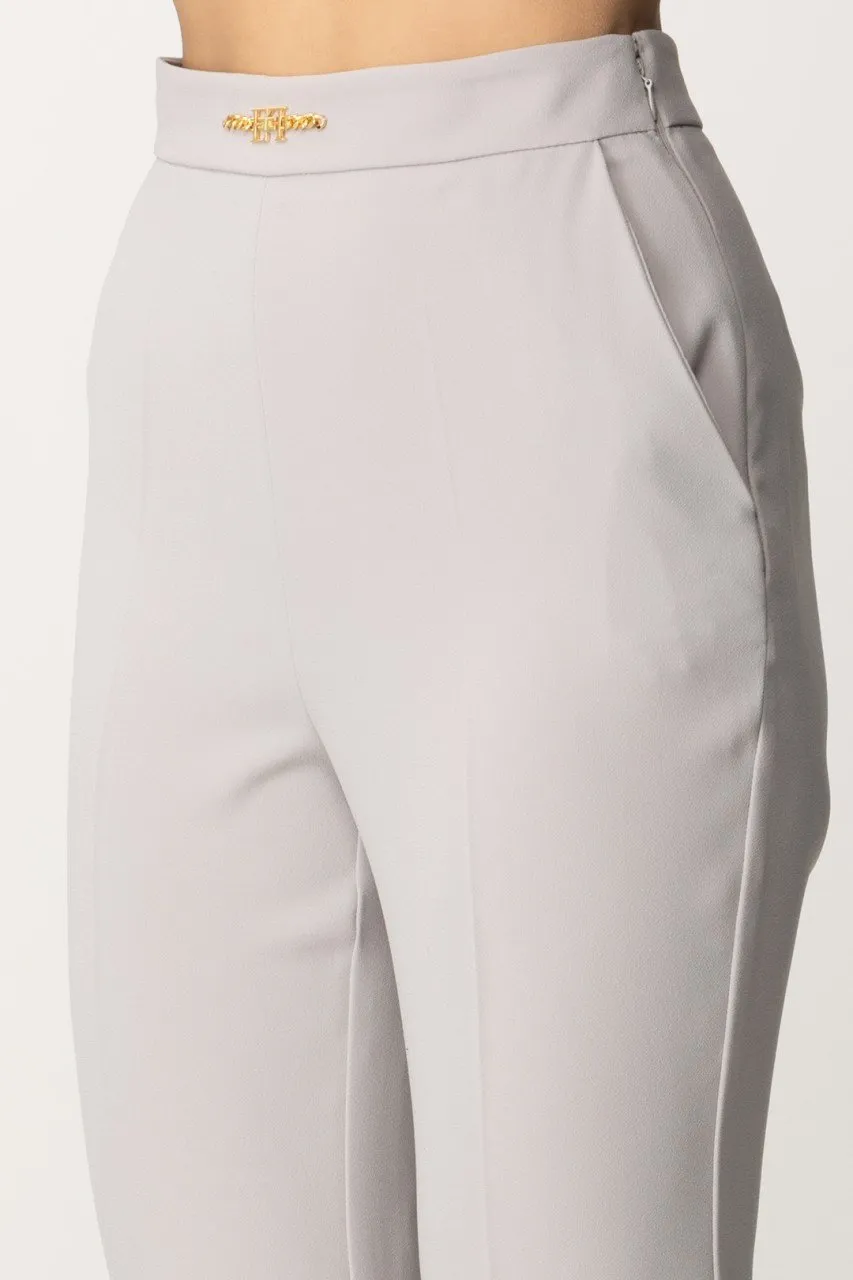 Pantaloni con logo in vita e spacchetti Perla