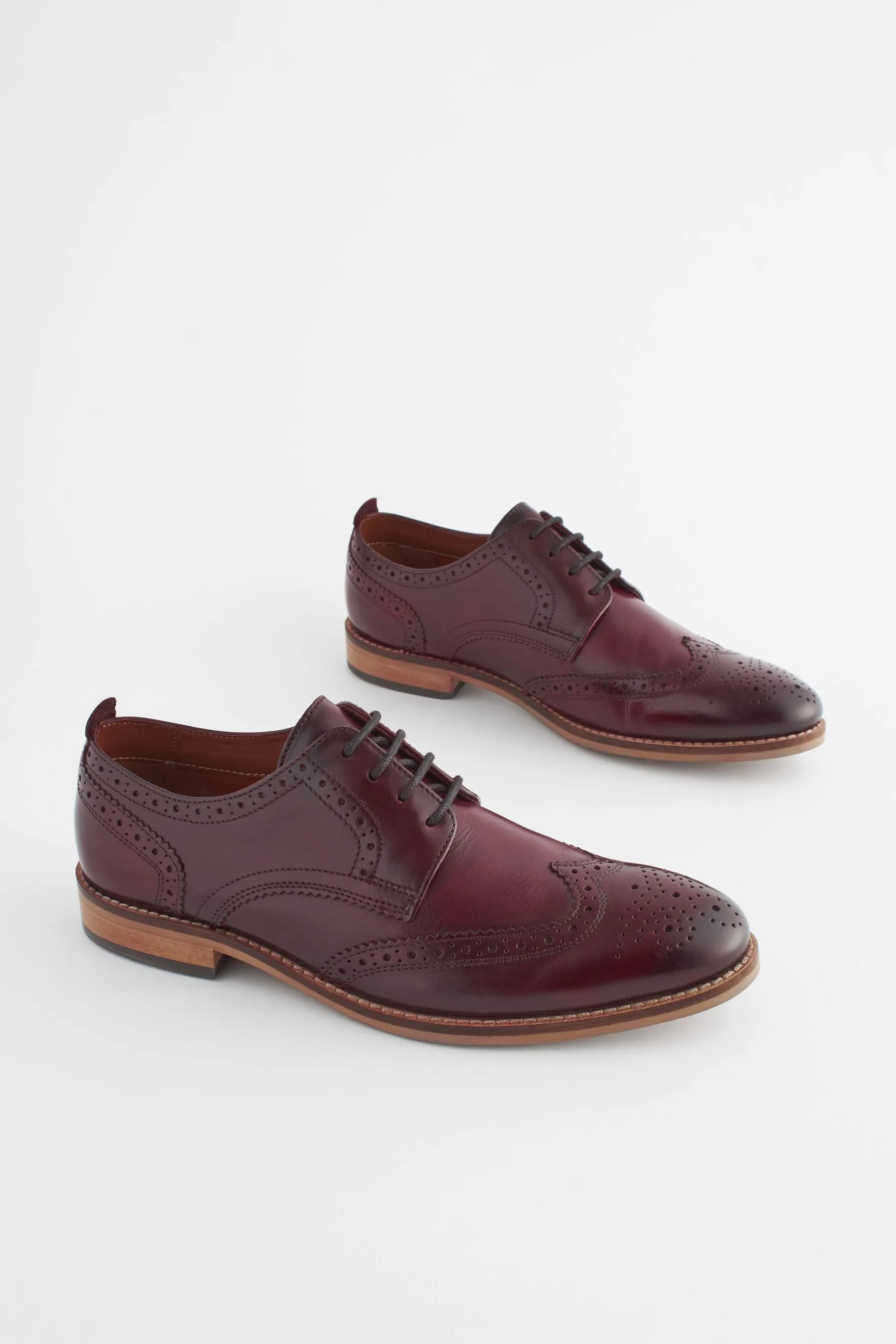 Scarpe brogue in pelle con suola a contrasto    