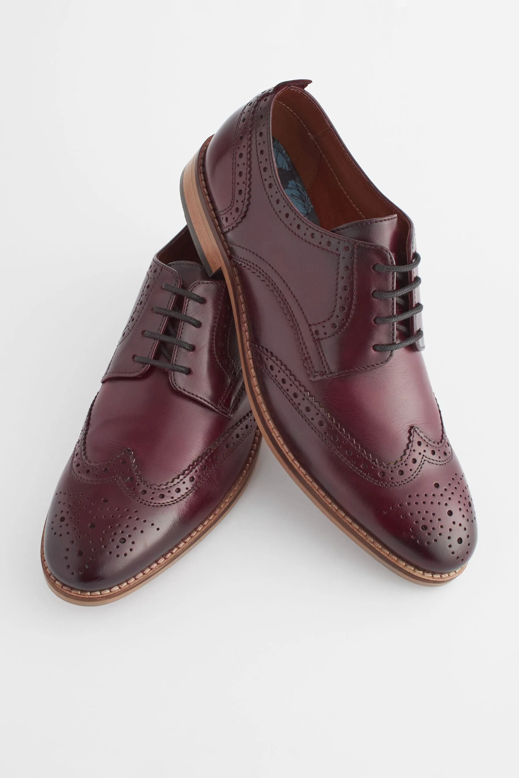 Scarpe brogue in pelle con suola a contrasto    